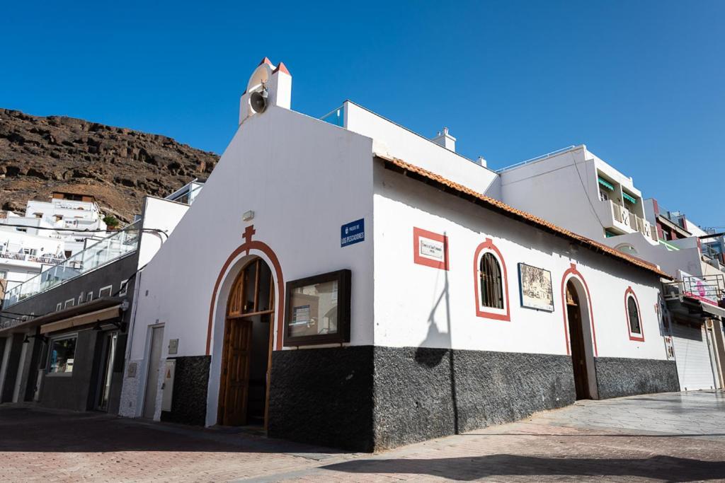 Edificio Playa Apartment Puerto De Mogan Bagian luar foto